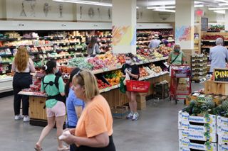 US Consumer Spending Up, Inflation Rises